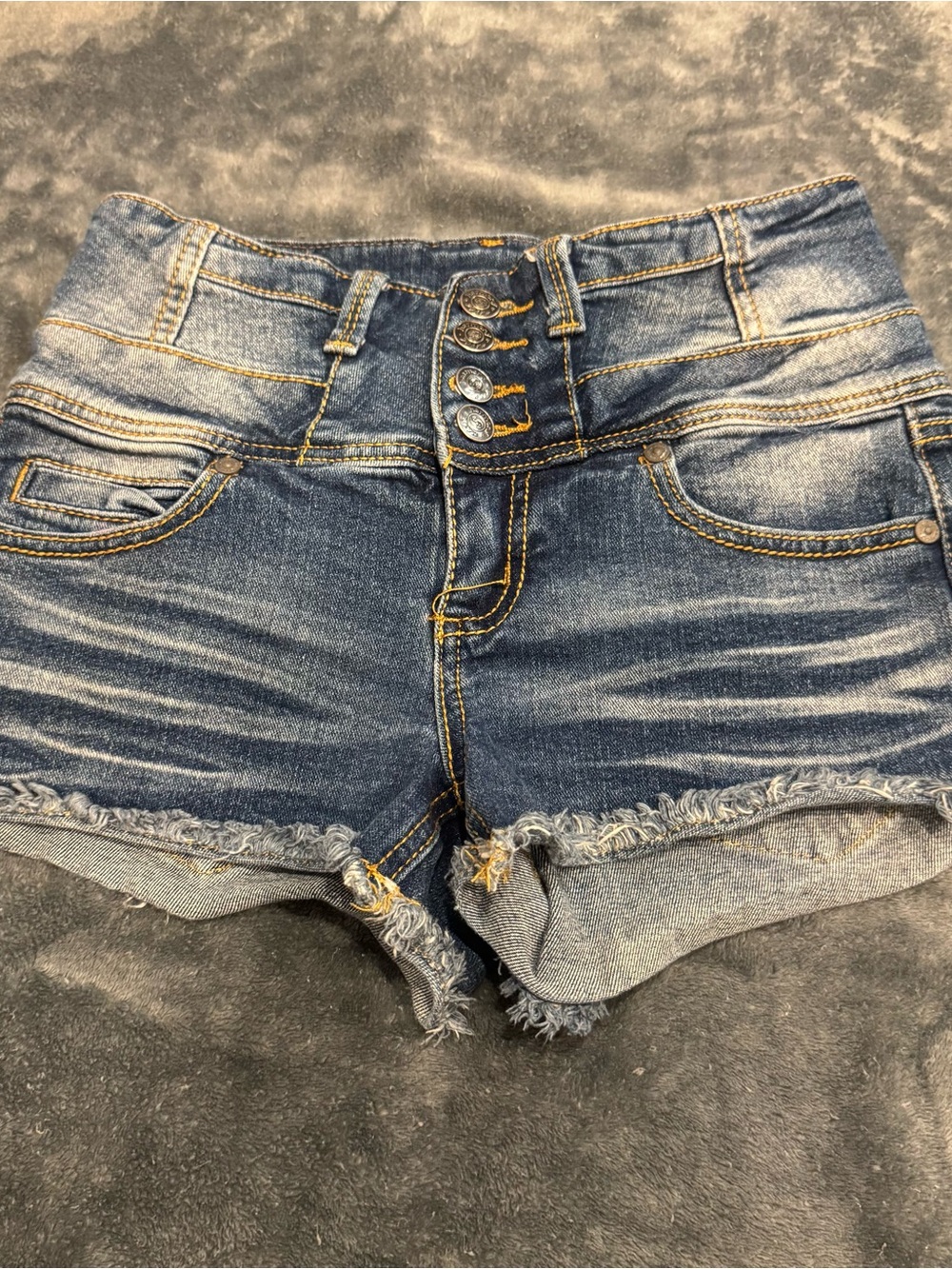 High-Rise Dark Blue Denim Cutoff Shorts with Button Fly Front